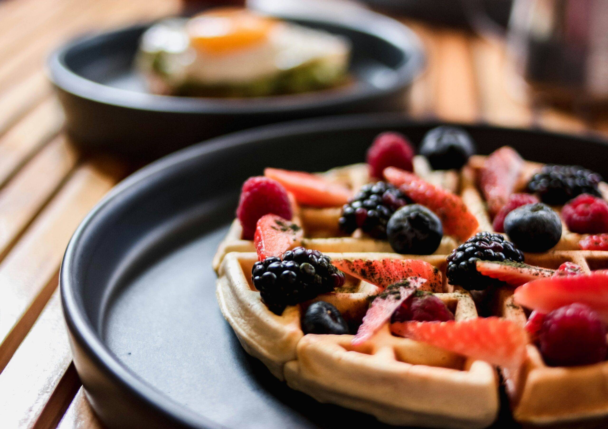 Indulge in the Irresistible: History of Belgian Waffles with Berries