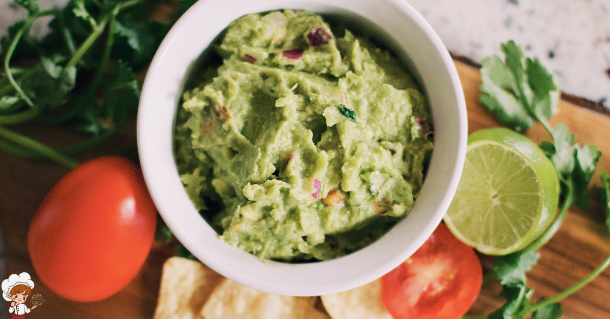 a bowl of guacamole and chips